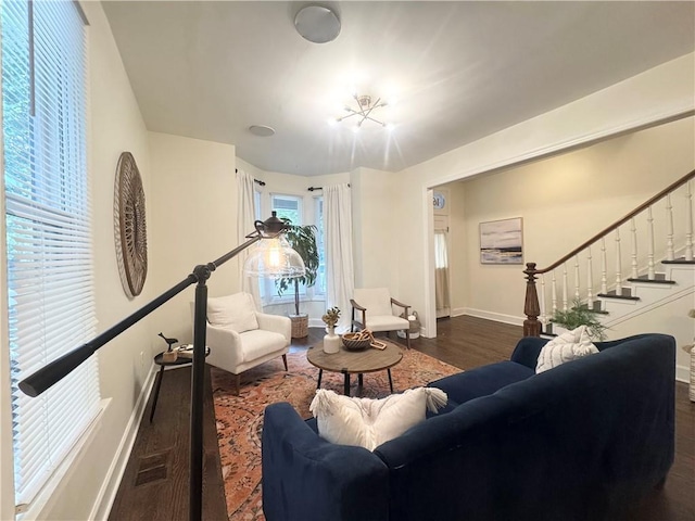 1643 Jefferson St, Kansas City, MO 64108 - living area featuring dark wood-style flooring and stairway
