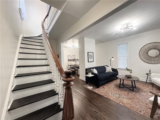 1643 Jefferson St, Kansas City, MO 64108 - living area featuring wood finished floors and stairway