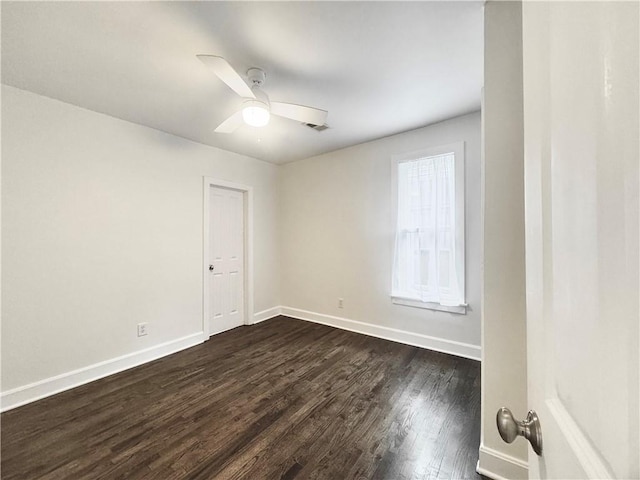 1643 Jefferson St, Kansas City, MO 64108 - empty room featuring dark wood finished floors and a ceiling fan