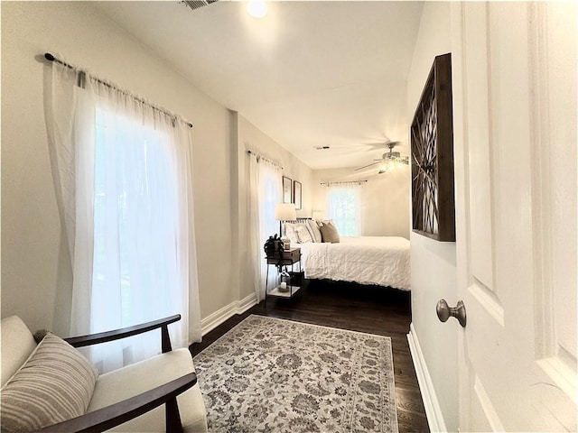 1643 Jefferson St, Kansas City, MO 64108 - bedroom with baseboards and dark wood-style flooring