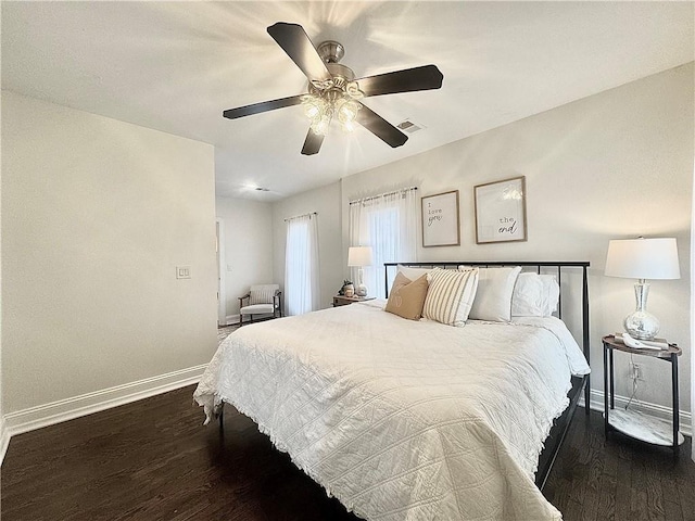 1643 Jefferson St, Kansas City, MO 64108 - bedroom with dark wood-style flooring and ceiling fan