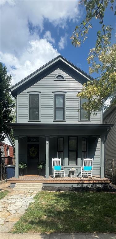 1643 Jefferson St, Kansas City, MO 64108 - view of front of house with a porch