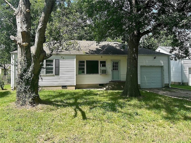 3107 Wood Ave, Parsons, KS 67357 - ranch-style home with an attached garage, entry steps, a front yard, and crawl space