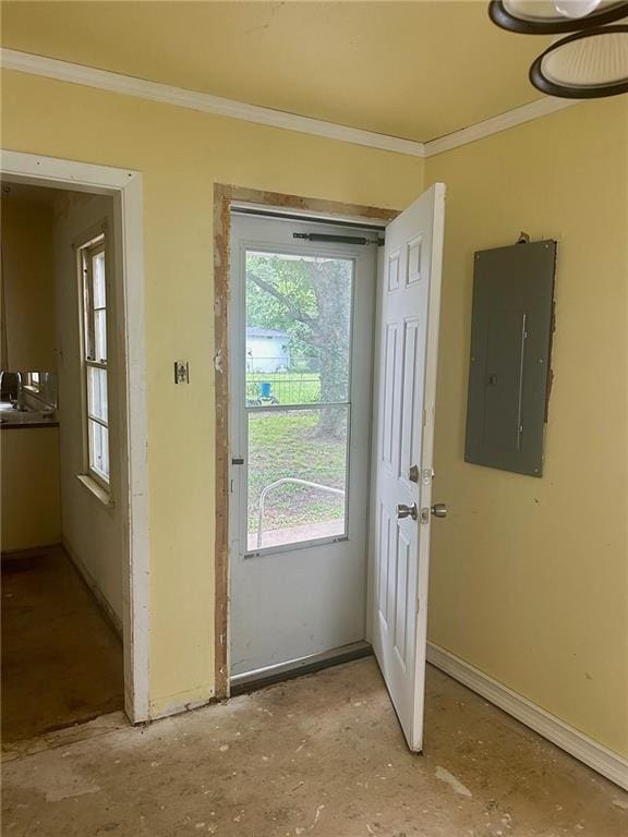 3107 Wood Ave, Parsons, KS 67357 - doorway to outside featuring electric panel and crown molding
