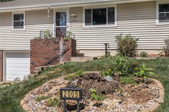 2005 Manor Pl, Blue Springs, MO 64015 - property entrance with an attached garage