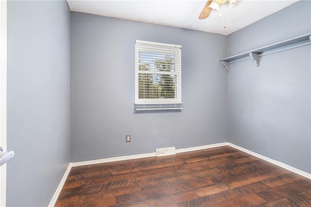 2005 Manor Pl, Blue Springs, MO 64015 - spare room featuring a ceiling fan and wood finished floors