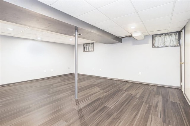 2005 Manor Pl, Blue Springs, MO 64015 - finished below grade area featuring wood finished floors and a paneled ceiling