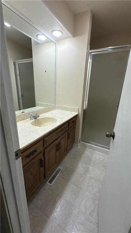 11965 W 66th St, Shawnee, KS 66216 - full bathroom featuring vanity and a shower stall