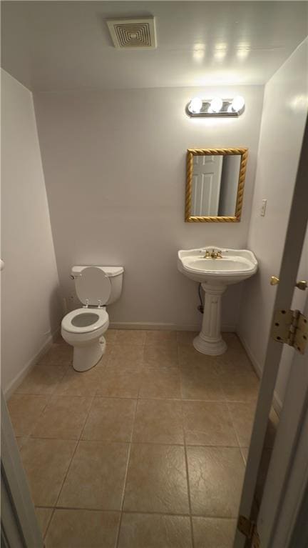 11965 W 66th St, Shawnee, KS 66216 - bathroom with toilet and tile patterned floors