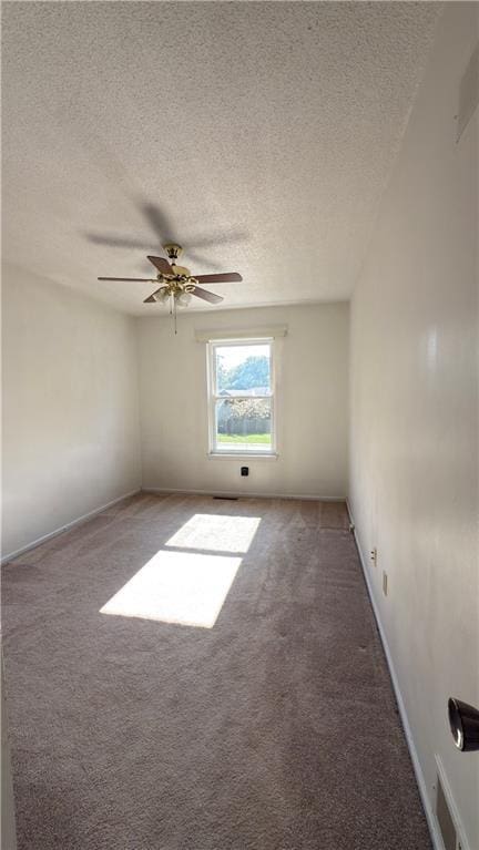 11965 W 66th St, Shawnee, KS 66216 - spare room with carpet, a textured ceiling, and ceiling fan