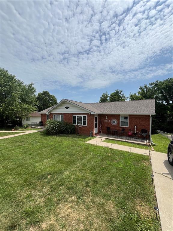 1835-1837 N 77th St, Kansas City, KS 66112 - single story home featuring brick siding and a front yard