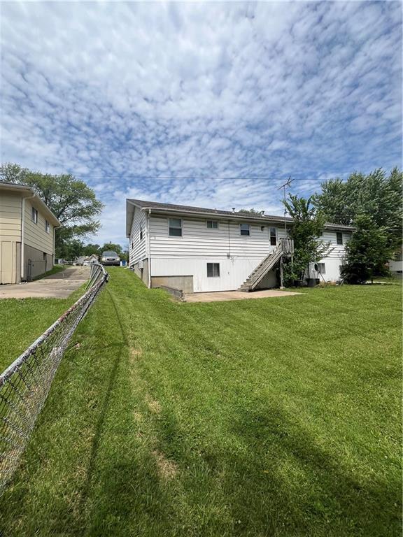 1835-1837 N 77th St, Kansas City, KS 66112 - rear view of house featuring stairs