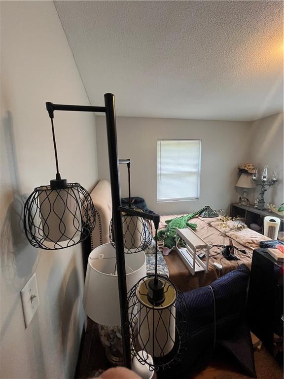 1835-1837 N 77th St, Kansas City, KS 66112 - bedroom with a textured ceiling