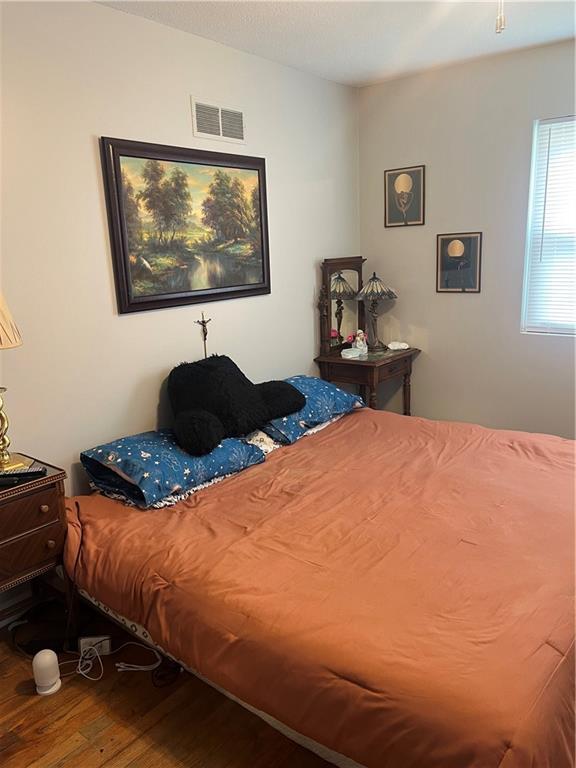 1835-1837 N 77th St, Kansas City, KS 66112 - bedroom with wood finished floors