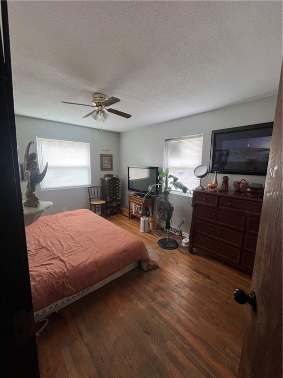 1835-1837 N 77th St, Kansas City, KS 66112 - bedroom with a textured ceiling, wood finished floors, and ceiling fan