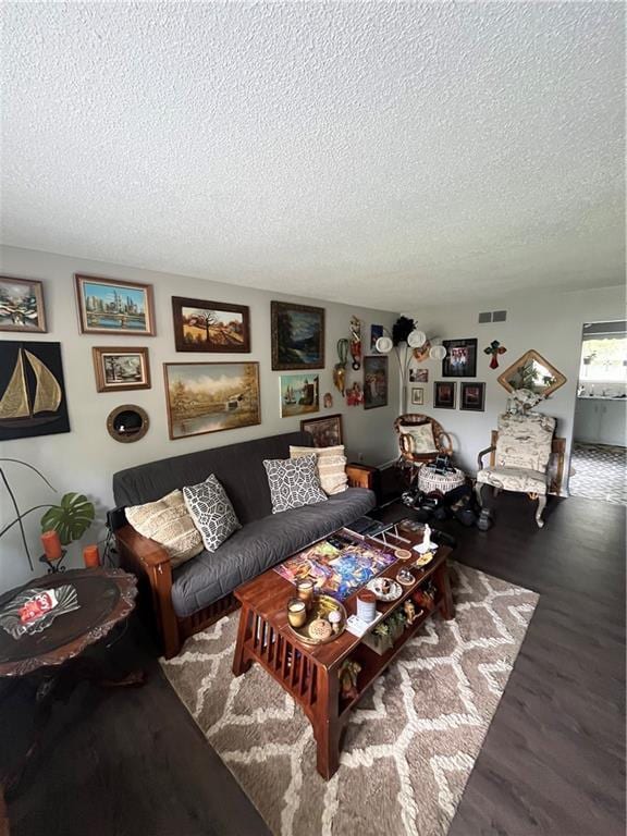 1835-1837 N 77th St, Kansas City, KS 66112 - living room with a textured ceiling and wood finished floors