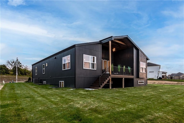 18221 W 168th Ter, Olathe, KS 66062 - back of property with a lawn and stairway