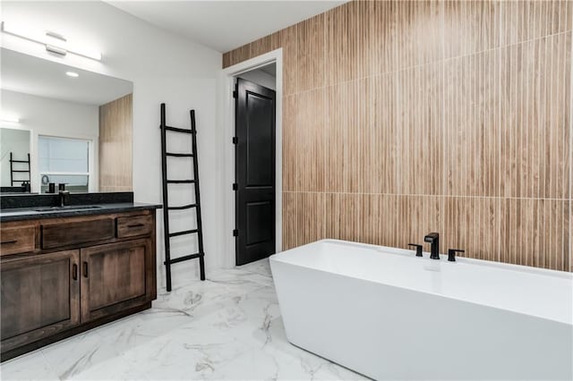 18221 W 168th Ter, Olathe, KS 66062 - bathroom with a soaking tub, vanity, and marble finish floors