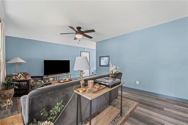 1520 E 18th St, Lawrence, KS 66044 - living area with wood finished floors and ceiling fan