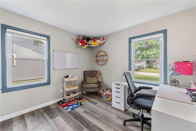 1520 E 18th St, Lawrence, KS 66044 - office featuring wood finished floors and baseboards