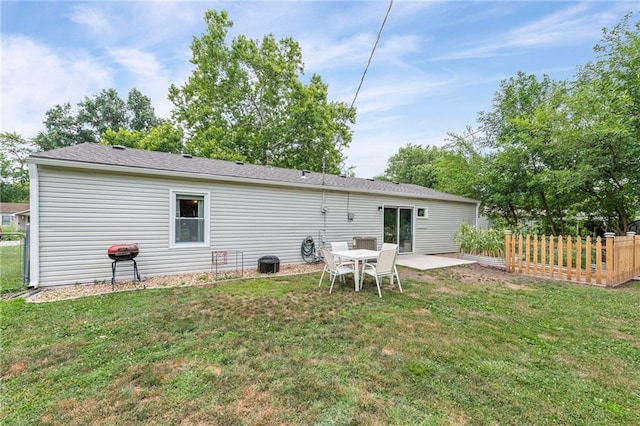 1520 E 18th St, Lawrence, KS 66044 - rear view of property featuring a patio area
