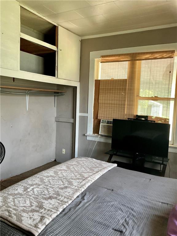 308 S 16th St, Independence, KS 67301 - bedroom with multiple windows