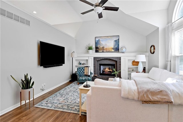 16113 S Cole St, Olathe, KS 66062 - living room with a ceiling fan, wood finished floors, lofted ceiling, a fireplace, and recessed lighting