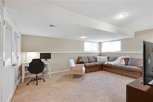 16113 S Cole St, Olathe, KS 66062 - carpeted living room featuring a textured ceiling, an office area, and recessed lighting