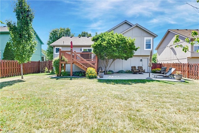 16113 S Cole St, Olathe, KS 66062 - back of property with a fenced backyard, stairs, a patio area, and a wooden deck
