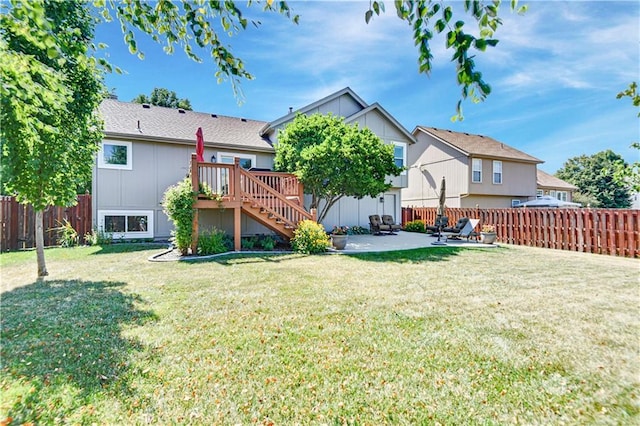 16113 S Cole St, Olathe, KS 66062 - rear view of property with stairs, a fenced backyard, a wooden deck, and a patio area