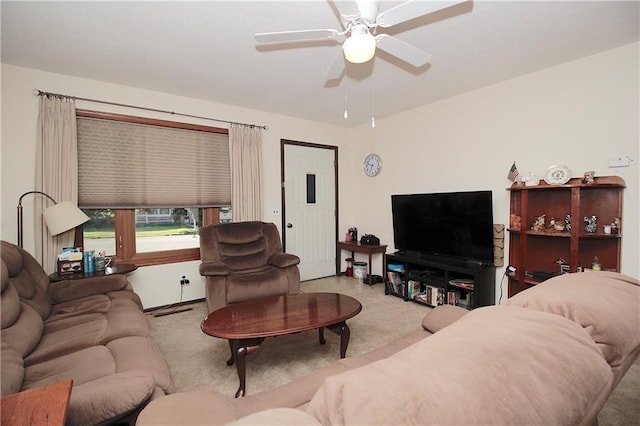 414 N Ash St, Garnett, KS 66032 - living area featuring ceiling fan and carpet
