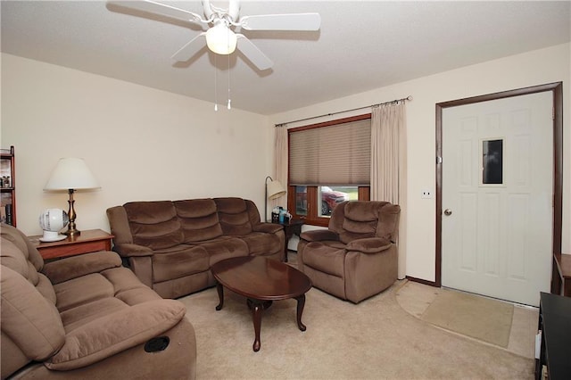 414 N Ash St, Garnett, KS 66032 - living area featuring ceiling fan and light colored carpet