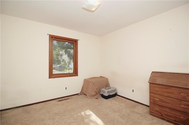 414 N Ash St, Garnett, KS 66032 - unfurnished room with light carpet and baseboards