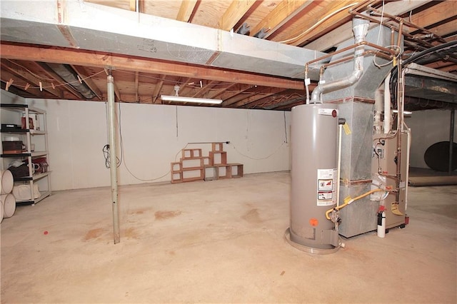 414 N Ash St, Garnett, KS 66032 - unfinished basement with water heater and heating unit