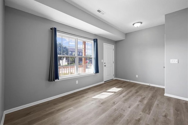 2814 N 100th St, Kansas City, KS 66109 - unfurnished room featuring wood finished floors and baseboards