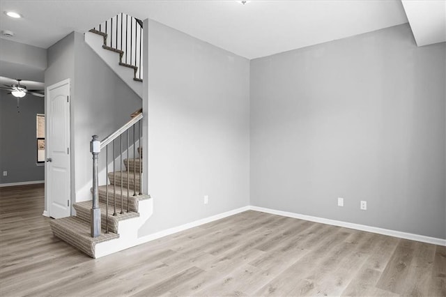 2814 N 100th St, Kansas City, KS 66109 - stairs featuring wood finished floors, a ceiling fan, and recessed lighting