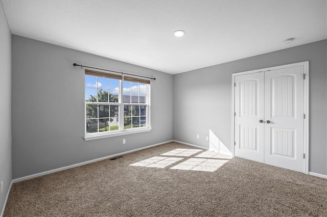 2814 N 100th St, Kansas City, KS 66109 - unfurnished bedroom with carpet flooring and a closet