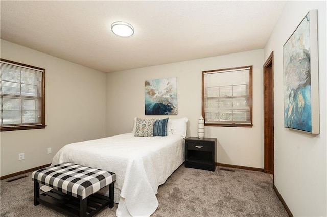 2618 Manor Ter, Lawrence, KS 66046 - carpeted bedroom featuring baseboards