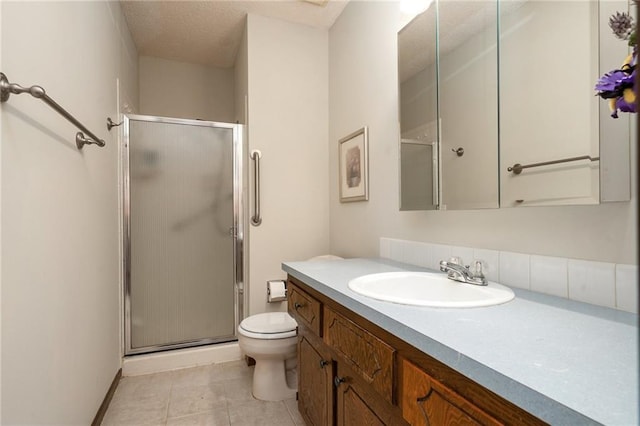 2618 Manor Ter, Lawrence, KS 66046 - full bath with vanity, a stall shower, a textured ceiling, and tile patterned floors
