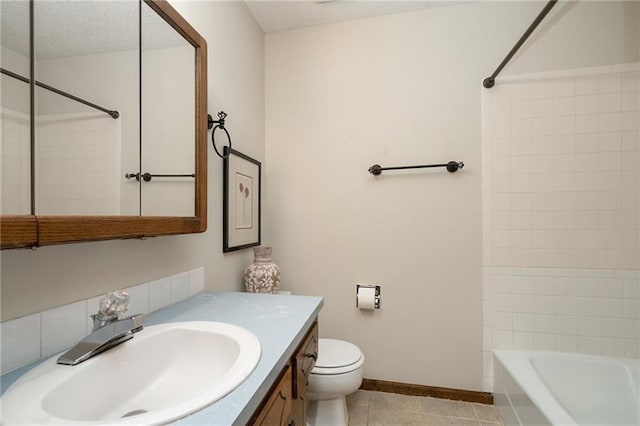 2618 Manor Ter, Lawrence, KS 66046 - full bathroom with vanity, a textured ceiling, tile patterned floors, and washtub / shower combination
