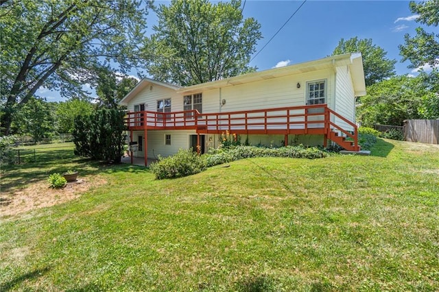 2618 Manor Ter, Lawrence, KS 66046 - rear view of house with a wooden deck