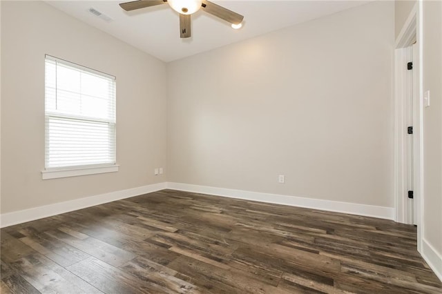 15904 E Cogan Ln, Independence, MO 64050 - spare room featuring ceiling fan and dark wood finished floors