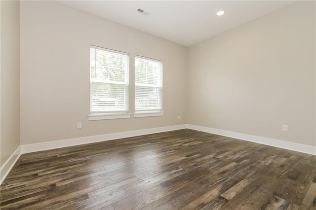 15904 E Cogan Ln, Independence, MO 64050 - unfurnished room featuring dark wood-style floors and recessed lighting