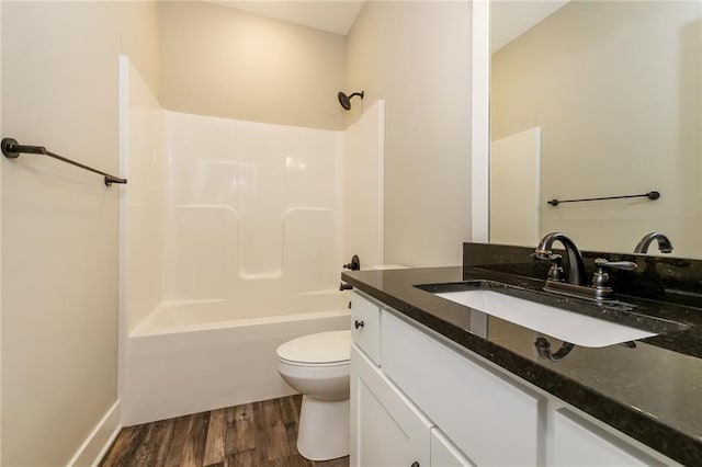 15904 E Cogan Ln, Independence, MO 64050 - full bathroom with wood finished floors, vanity, and shower / bath combination