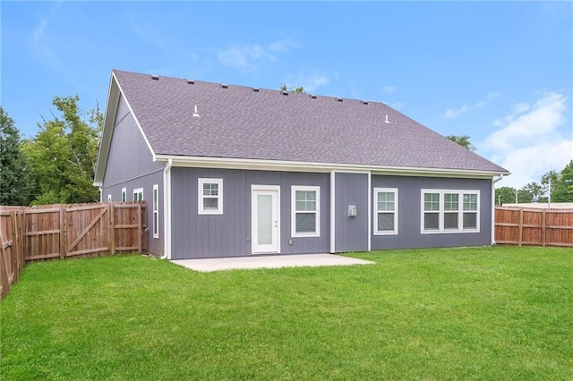 15904 E Cogan Ln, Independence, MO 64050 - rear view of house with a patio, a fenced backyard, roof with shingles, and a gate