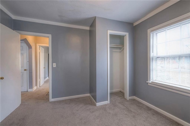 904 E 84th St, Kansas City, MO 64131 - unfurnished bedroom featuring carpet floors and a closet