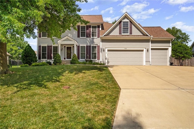508 Ambersham Dr, Lees Summit, MO 64081 - colonial inspired home with concrete driveway and an attached garage