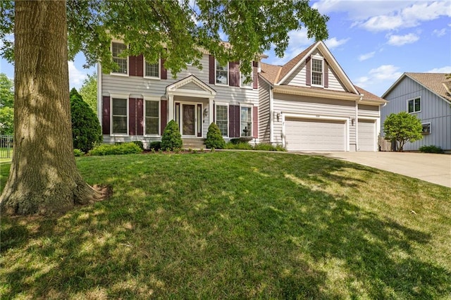 508 Ambersham Dr, Lees Summit, MO 64081 - view of front of home featuring driveway, a front lawn, and a garage