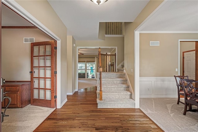 508 Ambersham Dr, Lees Summit, MO 64081 - entrance foyer featuring wood finished floors, stairway, and crown molding