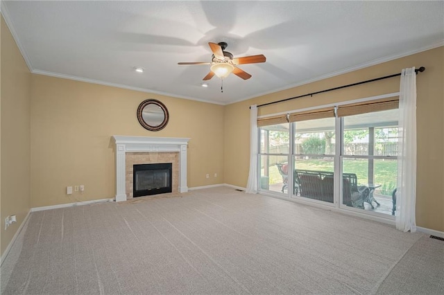 508 Ambersham Dr, Lees Summit, MO 64081 - unfurnished living room with a ceiling fan, carpet, crown molding, a tile fireplace, and recessed lighting
